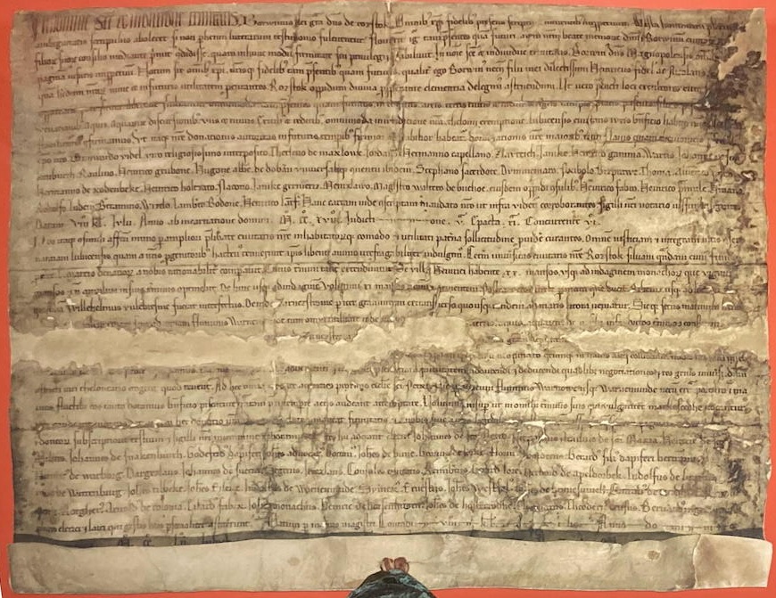 Urkundes über den Verkauf etlicher Flächen und Rechte an Rostock durch Borwin III.